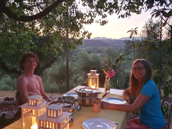 Dinner outdoors by the light of a lantern
